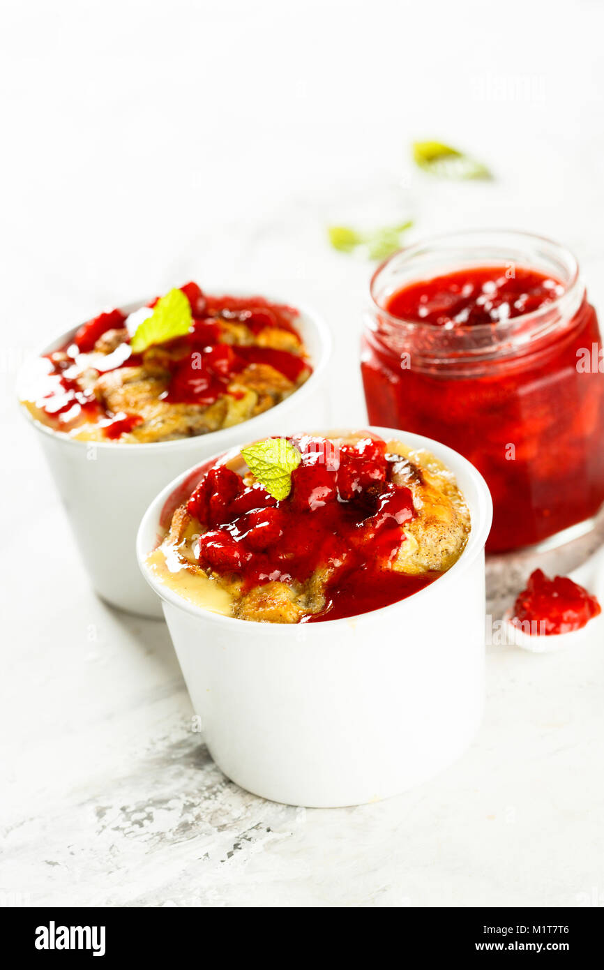 Bread pudding with strawberry jam Stock Photo Alamy