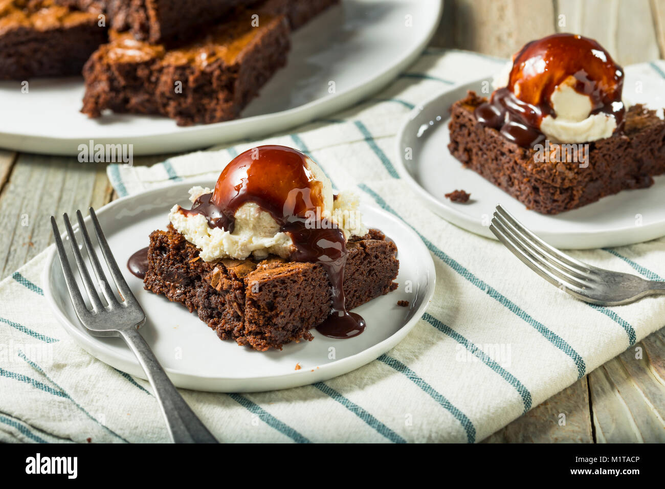 Double Dark Chocolate Brownies with Ice Cream Stock Photo Alamy