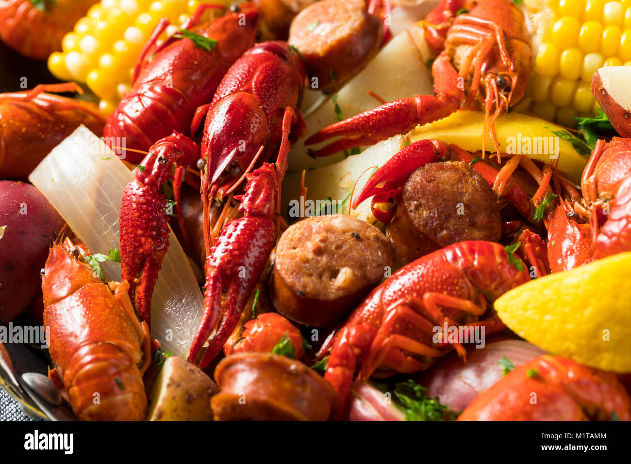 Homemade Southern Crawfish Boil with Potatoes Sausage and Corn Stock Photo