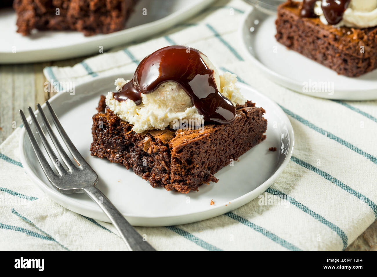 Double Dark Chocolate Brownies with Ice Cream Stock Photo Alamy