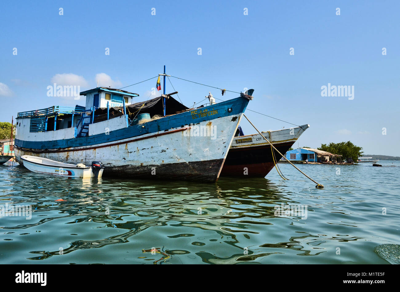 BARU, CARTAGENA, COLOMBIA - JANUARY 29, 2014: Anchored boats in a dock in Cartagena, seen on a tour way to Baru. Stock Photo