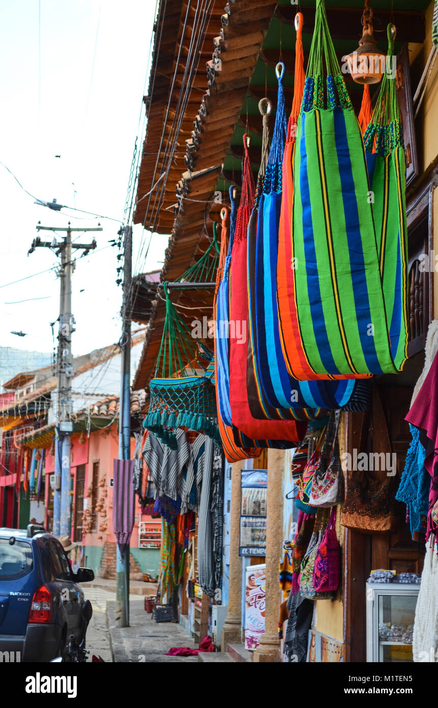 BOYACA, COLOMBIA - JANUARY 23, 2014: Various handcrafts at a local store in Raquira. Stock Photo