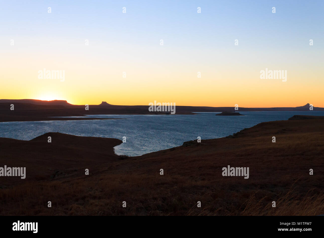 Sterkfontein Dam Nature Reserve dawn landscape, South Africa. African panorama. Drakensberg mountains Stock Photo