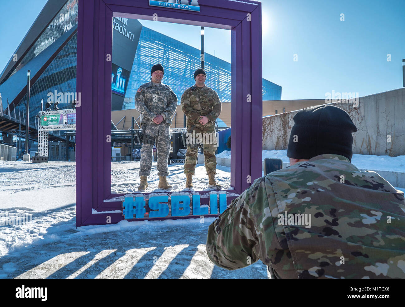 Minnesota police officers and Minnesota National Guard Soldiers take