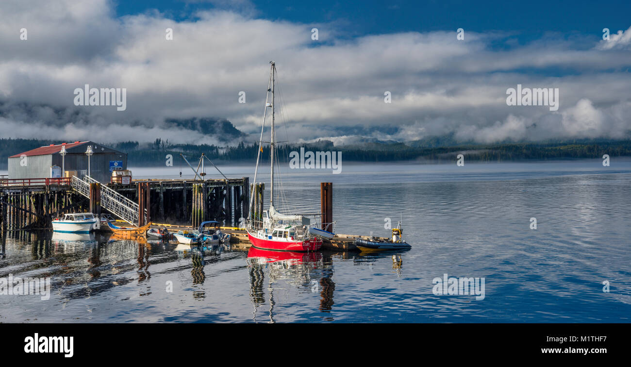 Boats at Boat Harbour, Vancouver Island shore in background, village of ...