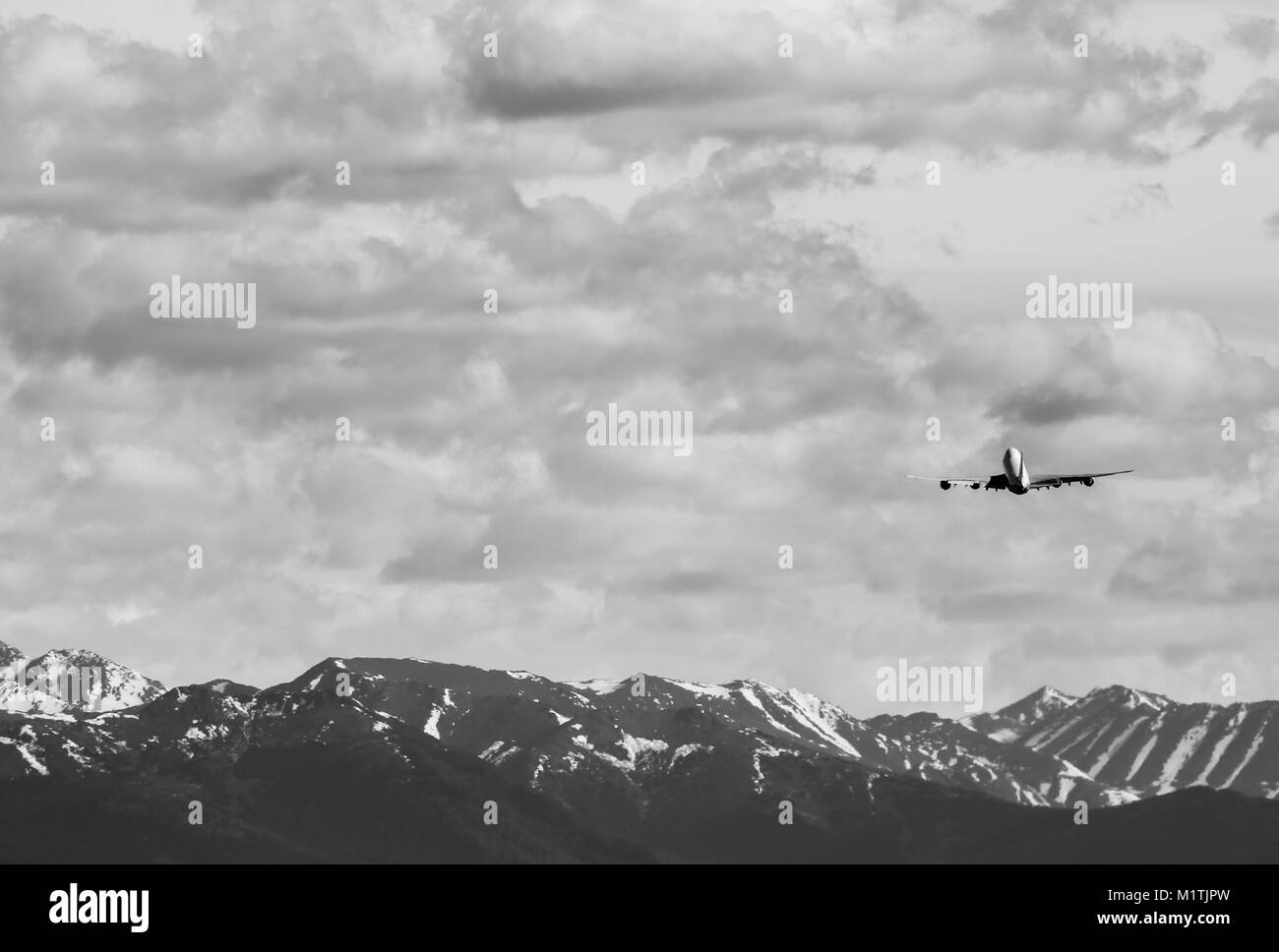 ANCHORAGE, USA - MAY 17, 2017:  An aircraft Boeing 747 of Cathay Pacific Cargo starting at Ted Stevens International Airport in Anchorage in black and Stock Photo