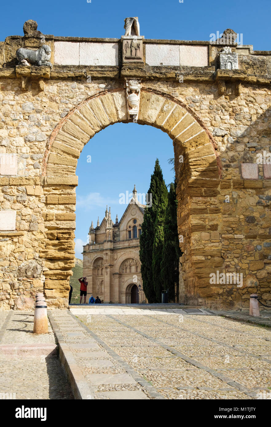 Giants Arch (Arco de los Gigantes] to the Royal Collegiate Church of Santa María La Mayor (Colegiata de Santa Maria la mayor), Antequera, Spain Stock Photo