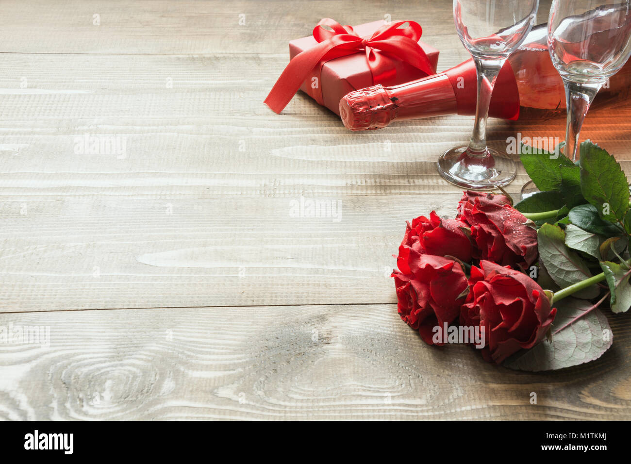 Valentines day greeting card with bouquet red rose flowers, a bottle of ...