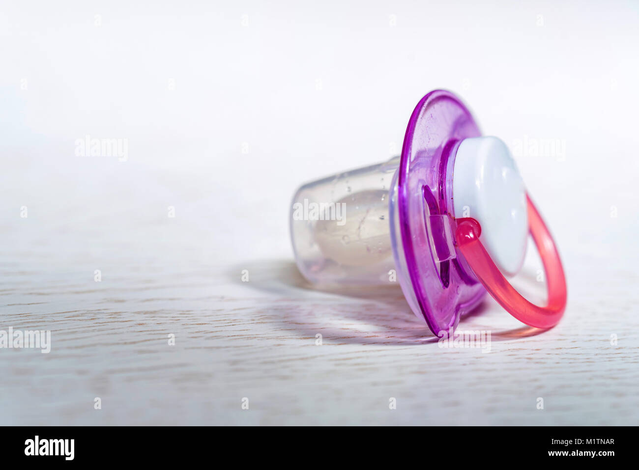 Sucking dummy pacifier hi-res stock photography and images - Alamy