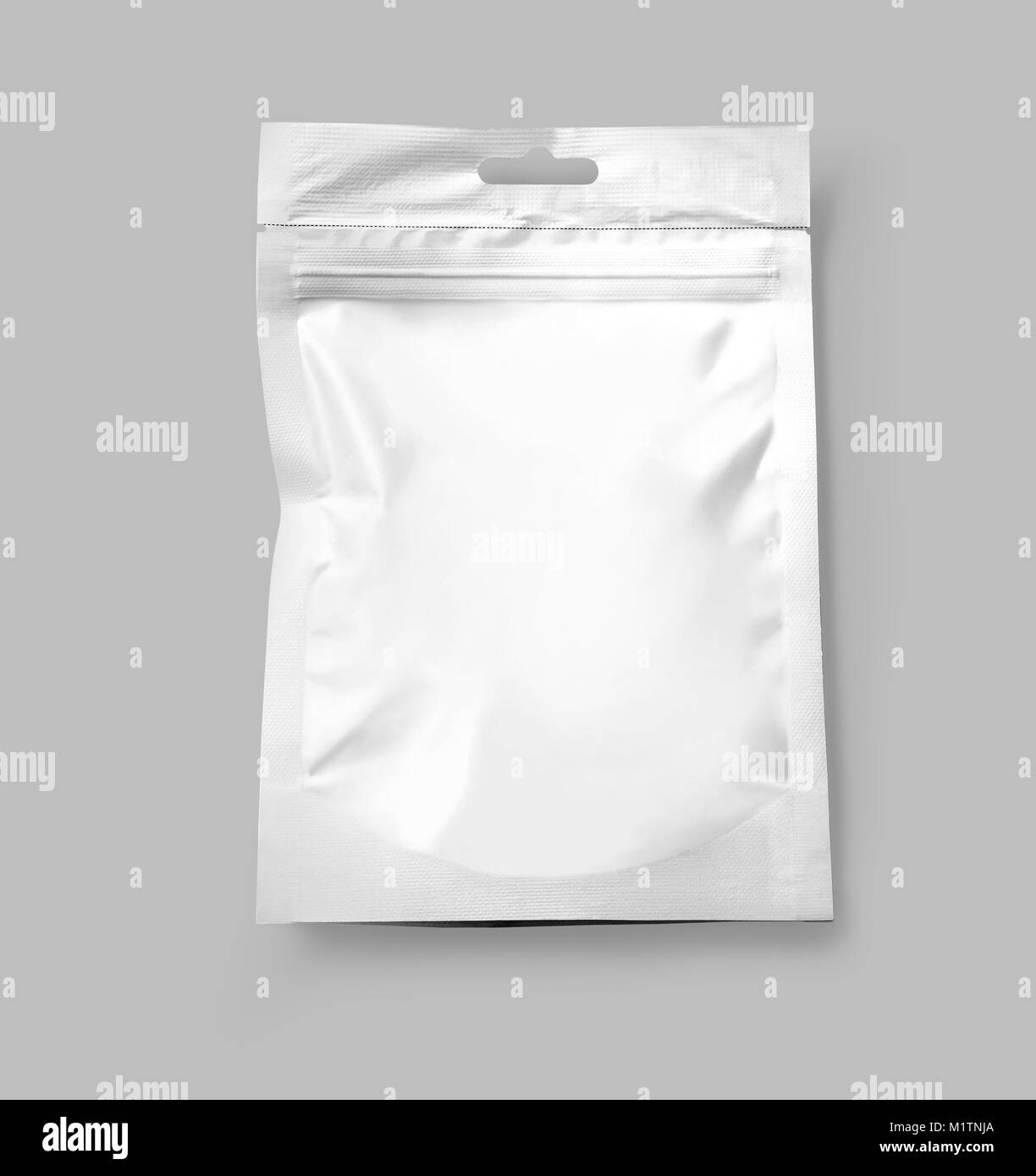 Top view of blank paper pouch food packaging isolated on gray with