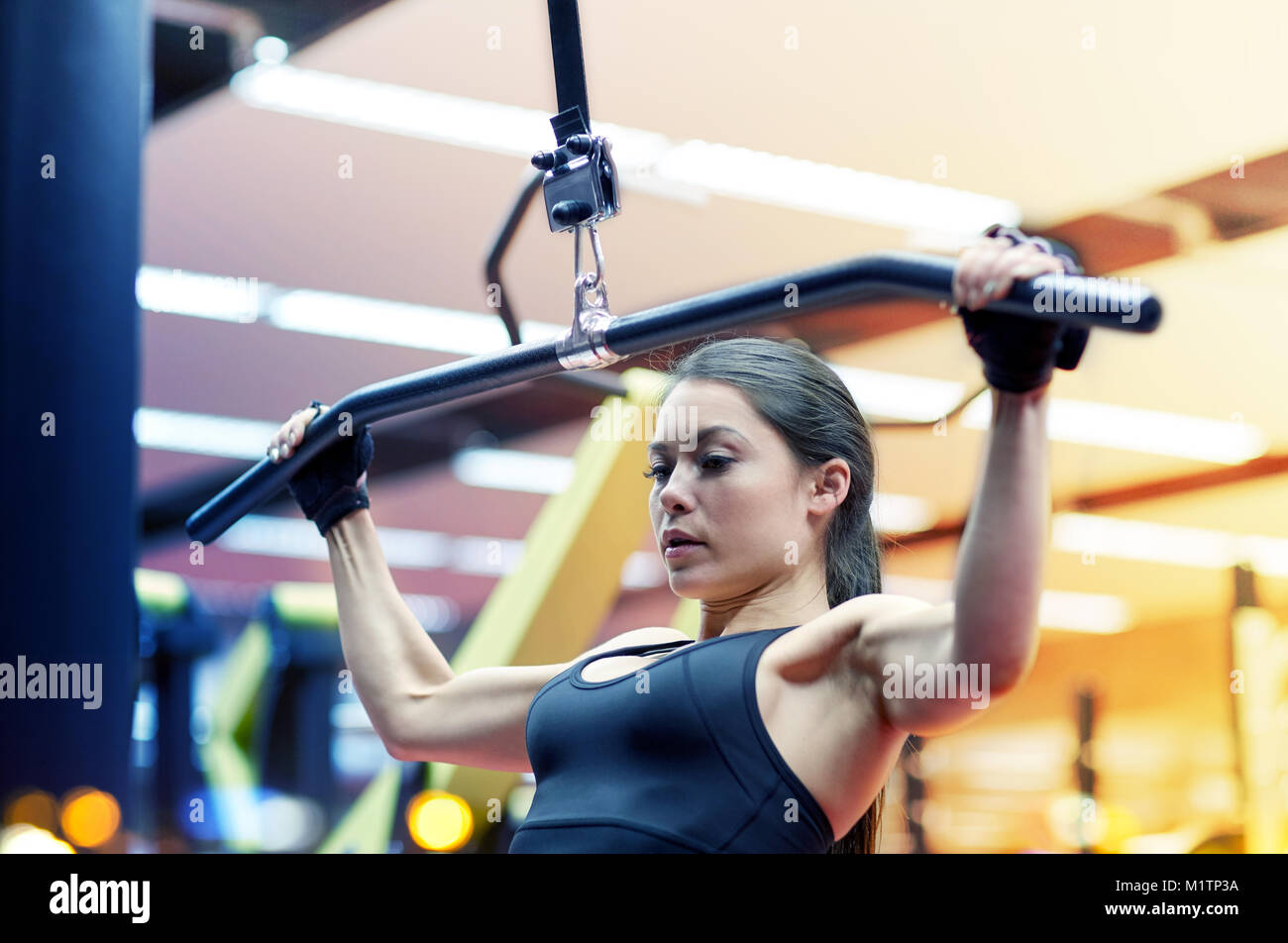 Muscular woman flexing arm hires stock photography and images Alamy