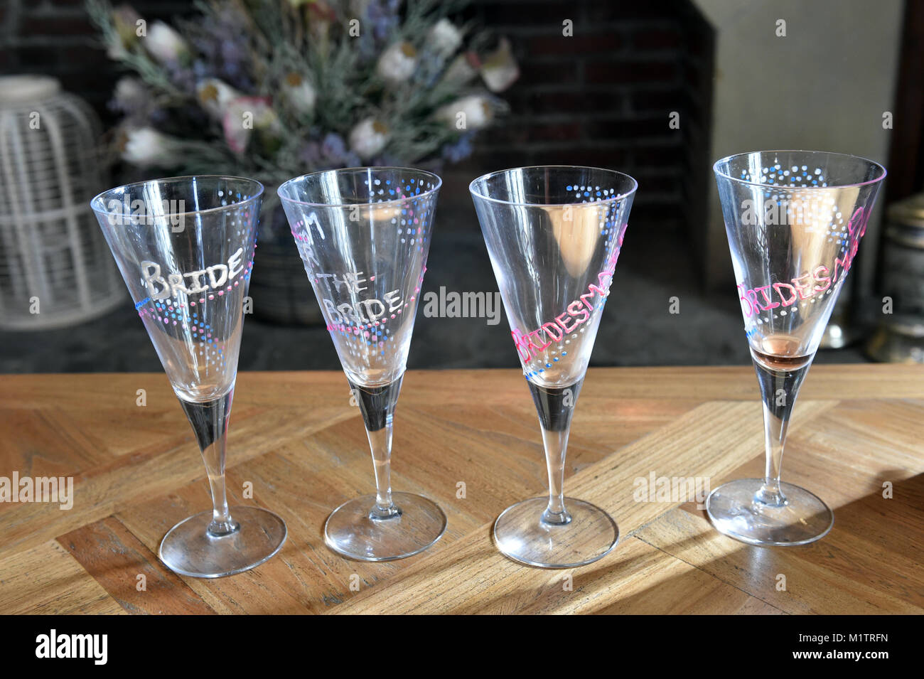 Special glasses for bride and bridesmaids getting ready for the wedding Stock Photo