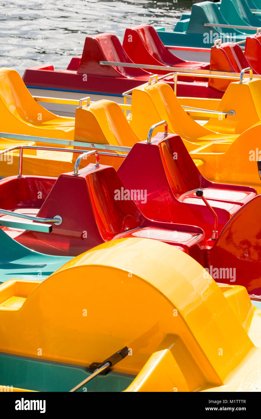 Colored pedalos on a lake are waiting for tourists Stock Photo Alamy