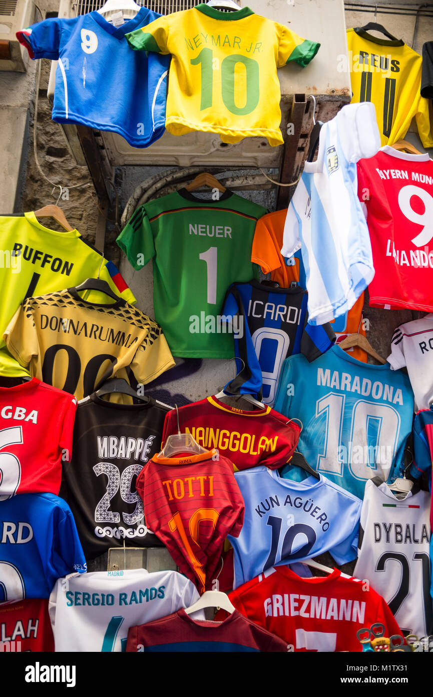 NAPLES, ITALY - OCTOBER 12, 2017: Colorful second-hand soccer team shirts  with player names and numbers hanging at a street market stall Stock Photo  - Alamy