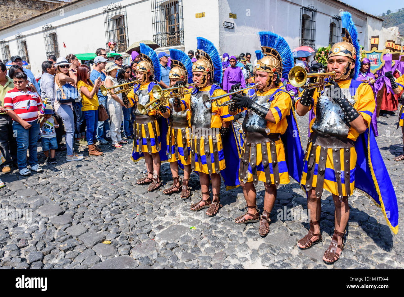 Antigua, Guatemala -  March 24, 2016: Romans signal approach of Holy Thursday procession in town with famous Holy Week celebrations Stock Photo