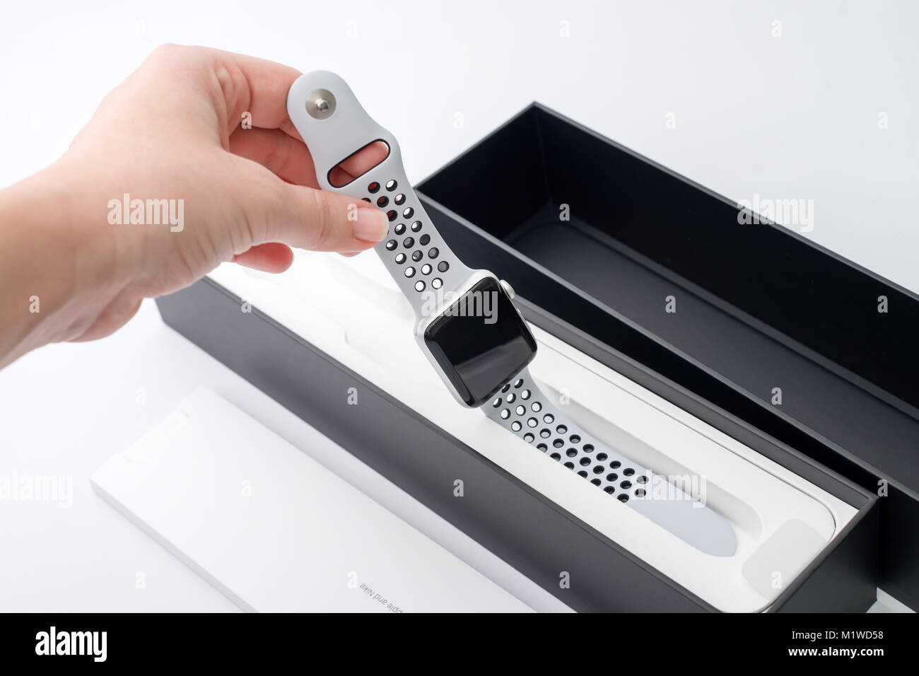 KYIV, UKRAINE - 26 JANUARY, 2018: Consultant unboxing a new Apple Watch Nike  Series 3 from the box on white table at the Apple Store Stock Photo - Alamy