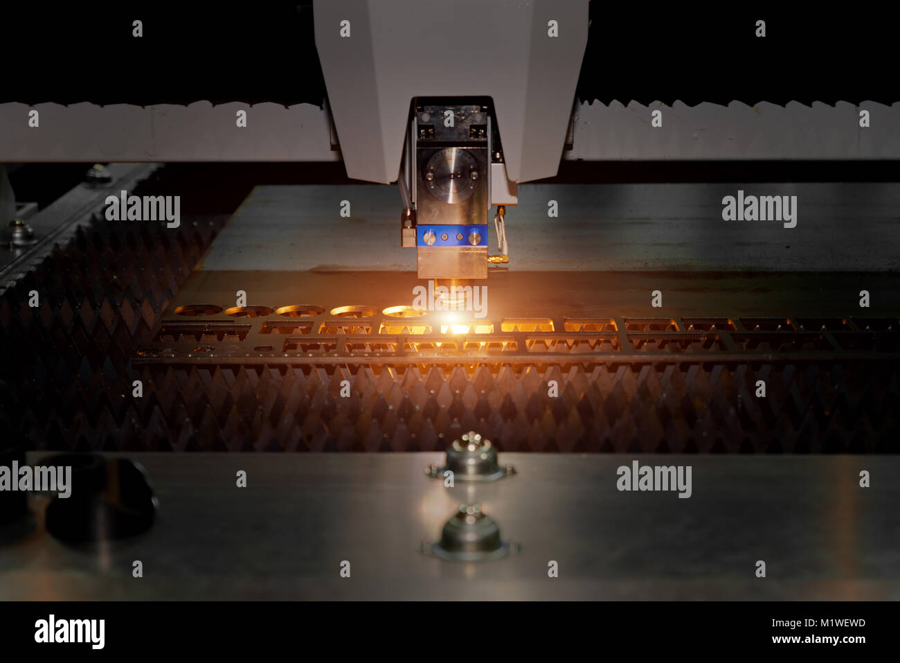 High precision CNC gas cutting metal sheet working in industry factory. Smart industry factory concept. Stock Photo