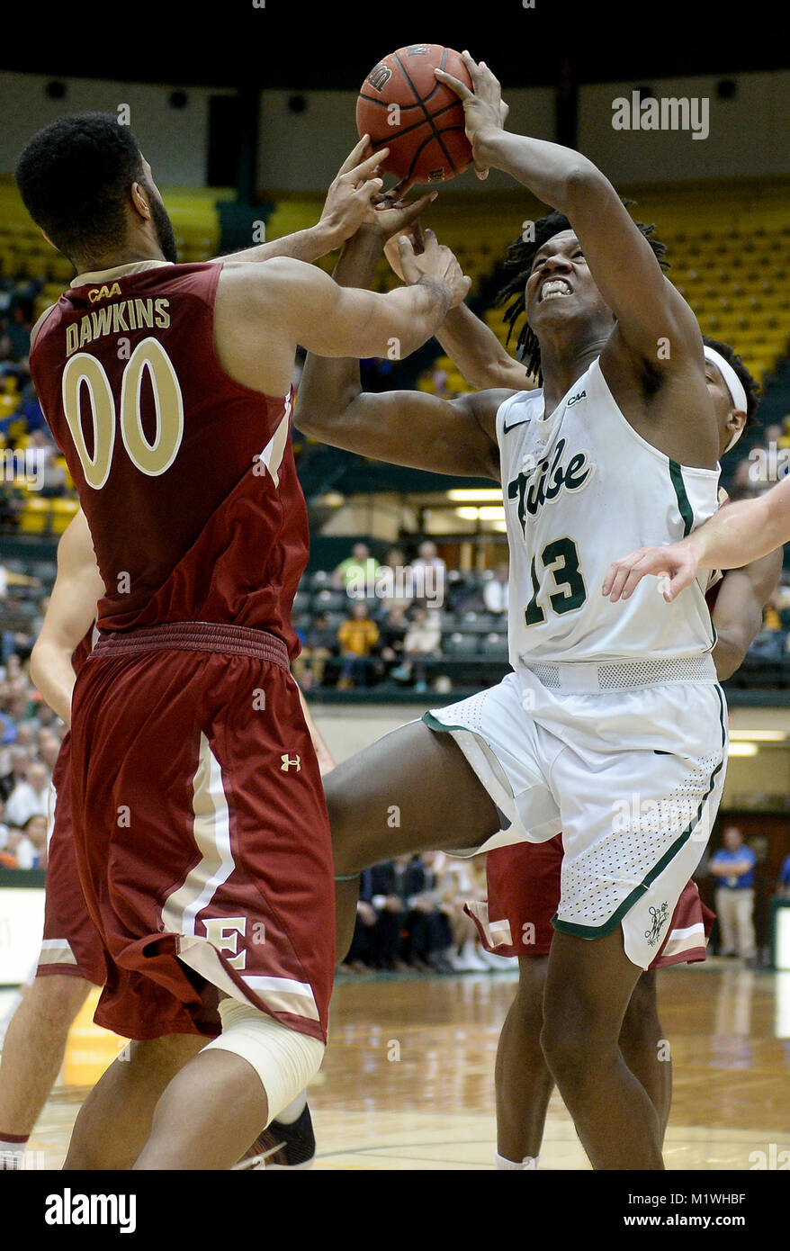 Williamsburg, VA, USA. 1st Feb, 2018. 20180201 - William and Mary forward NATHAN KNIGHT (13) battles for a rebound against Elon forward BRIAN DAWKINS (00) and Elon guard DMITRI THOMPSON (2), back, in the first half at Kaplan Arena in Williamsburg, Va. Credit: Chuck Myers/ZUMA Wire/Alamy Live News Stock Photo