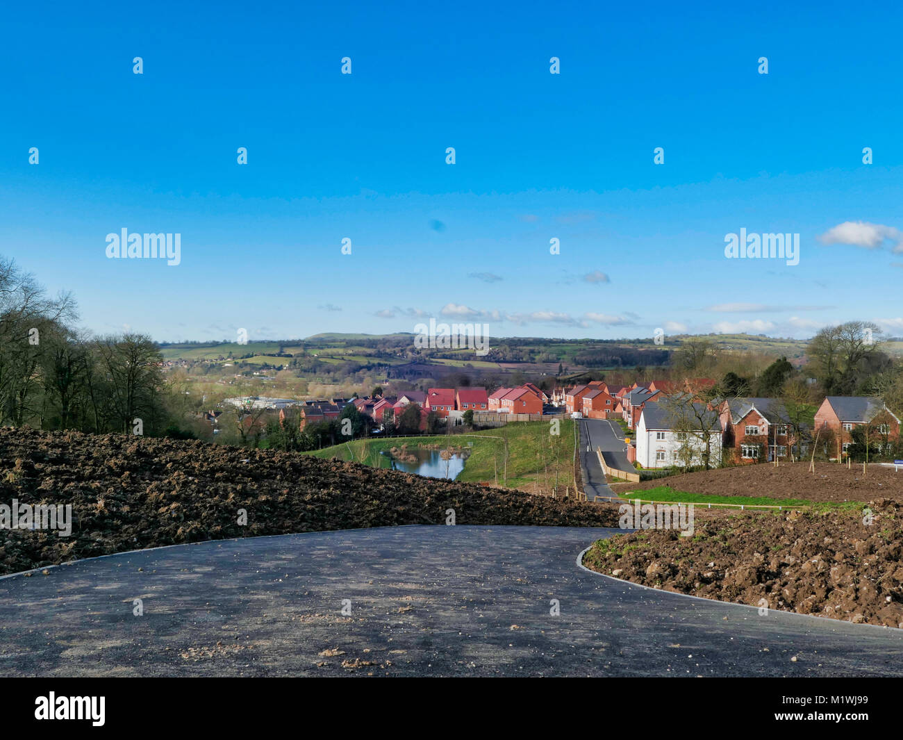 Ashbourne, Derbyshire. 2nd Feb, 2018. UK Weather: unusually warm & sunny Febrary day on a new housing development in Ashbourne Derbyshire the gateway for the Peak District National Park ahead of the Ashbourne shrovetide football match 2018 Credit: Doug Blane/Alamy Live News Stock Photo
