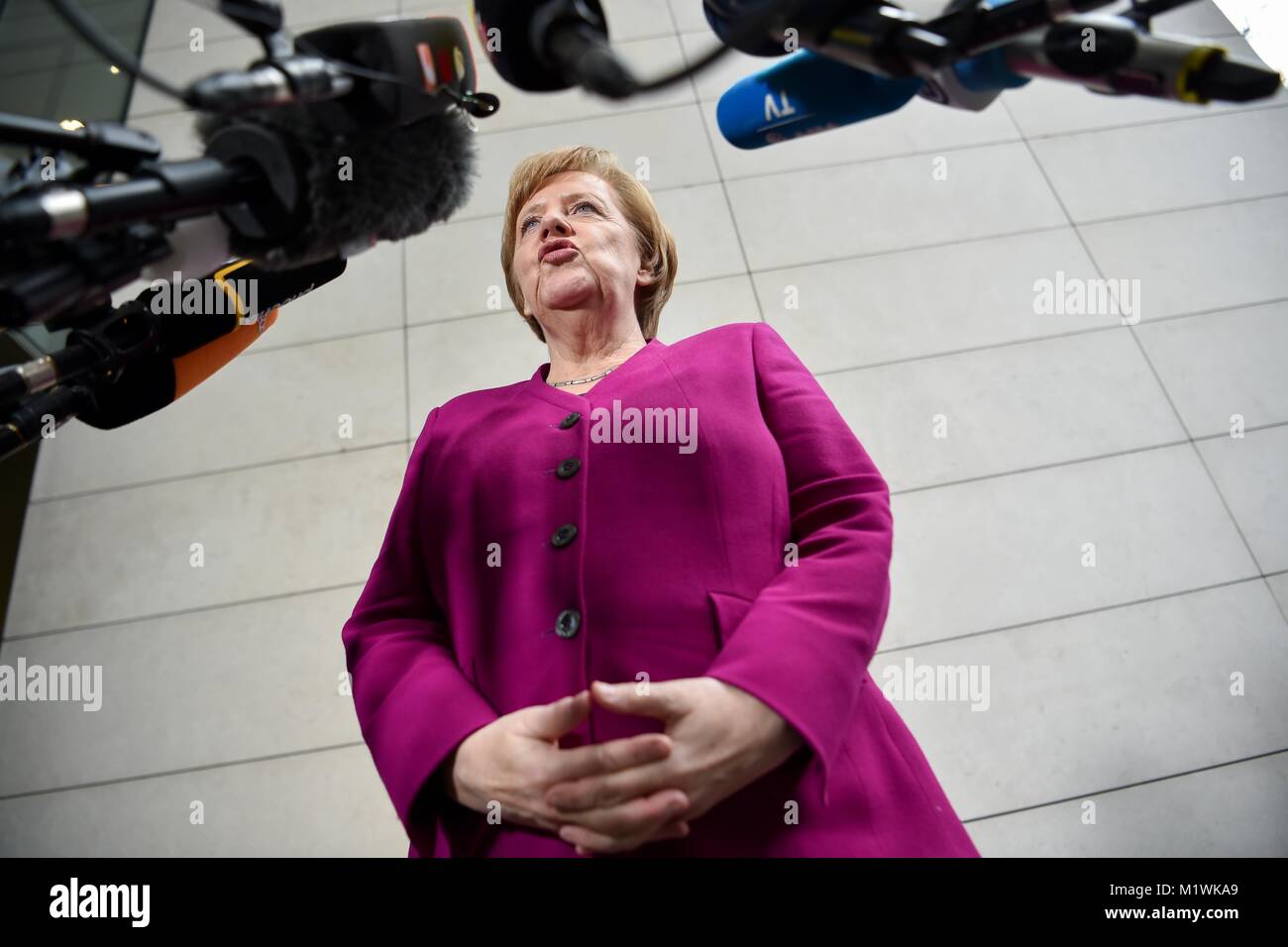 Berlin, Germany. 2nd Feb, 2018. Chancellor Angela Merkel of the Christian Democratic Union (CDU) arrives at the Willy-Brandt-House for coalition negotiations in Berlin, Germany, 2 February 2018. Credit: Sina Schuldt/dpa/Alamy Live News Stock Photo