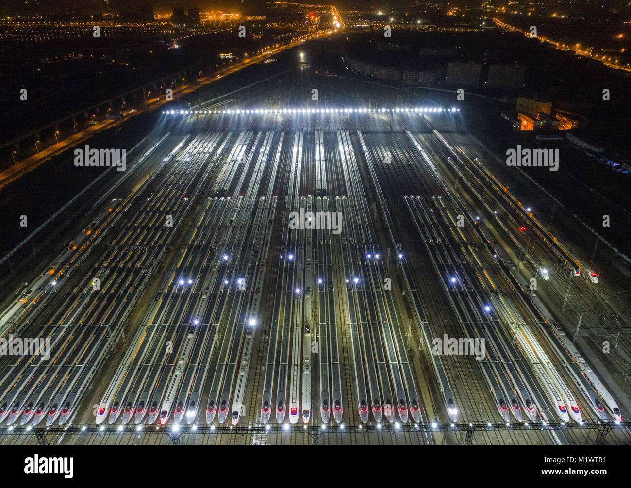 Wuhan, Wuhan, China. 1st Feb, 2018. Wuhan, CHINA-1st February 2018: High-speed trains wait to set off at the Wuhan Railway Station in Wuhan, central China's Hubei Province. The Spring Festival Travel Rush started on February 1st, 2018, in China. Credit: SIPA Asia/ZUMA Wire/Alamy Live News Stock Photo