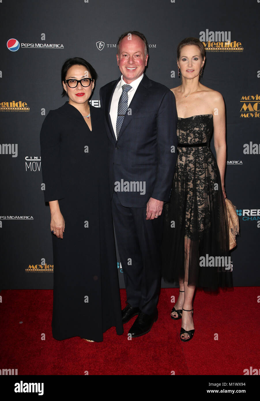 UNIVERSAL CITY, CA - Ramsey Ann Naito, Tom McGrath, Guest, at the 26th Annual Movieguide Awards at The Universal Hilton in Universal City, California on February 2, 2018. Credit: Faye Sadou/MediaPunch Stock Photo