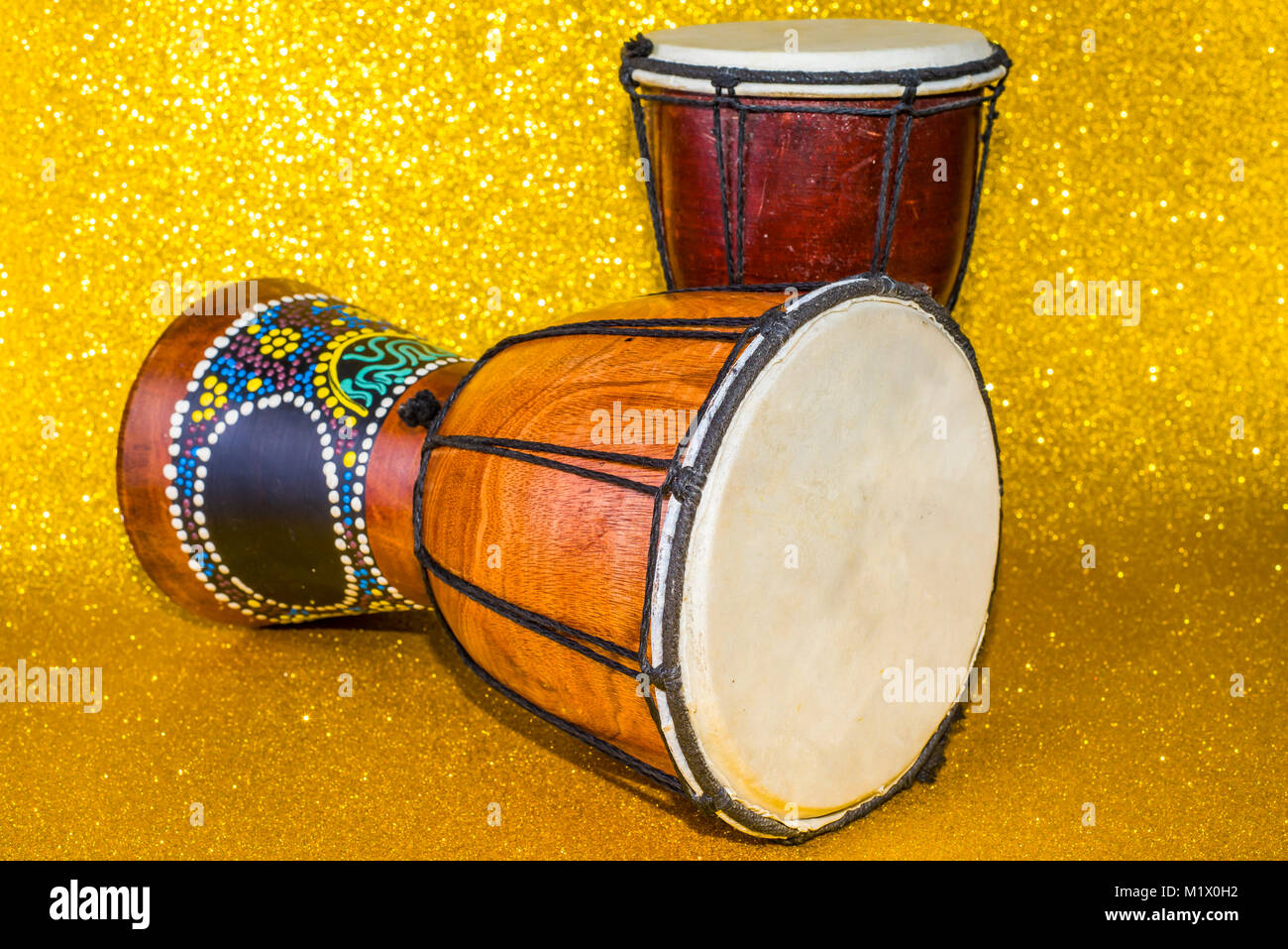Darbuka on a yellow background two pieces Stock Photo Alamy