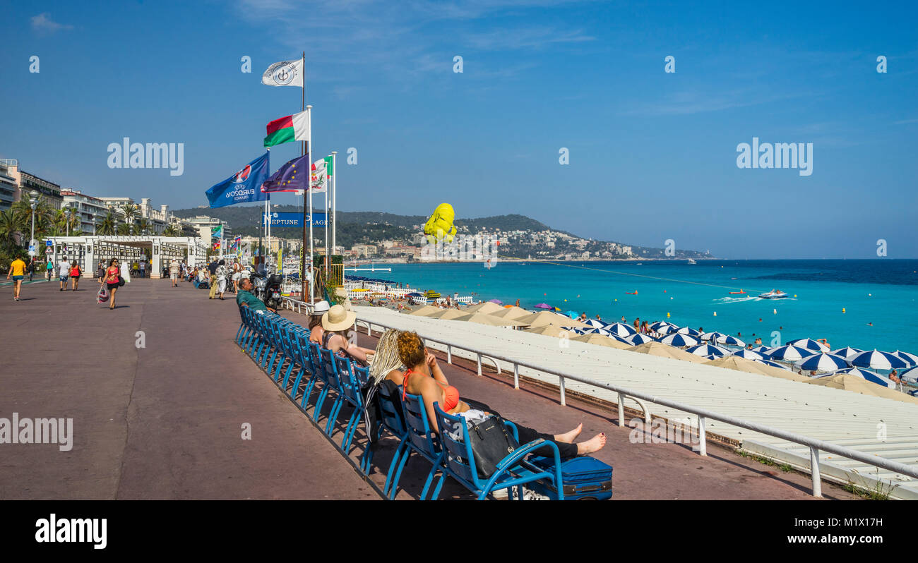 France, Alpes-Maritimes department, Côte d'Azur, Nice, sun seekers at the Promenade des Anglais, Stock Photo