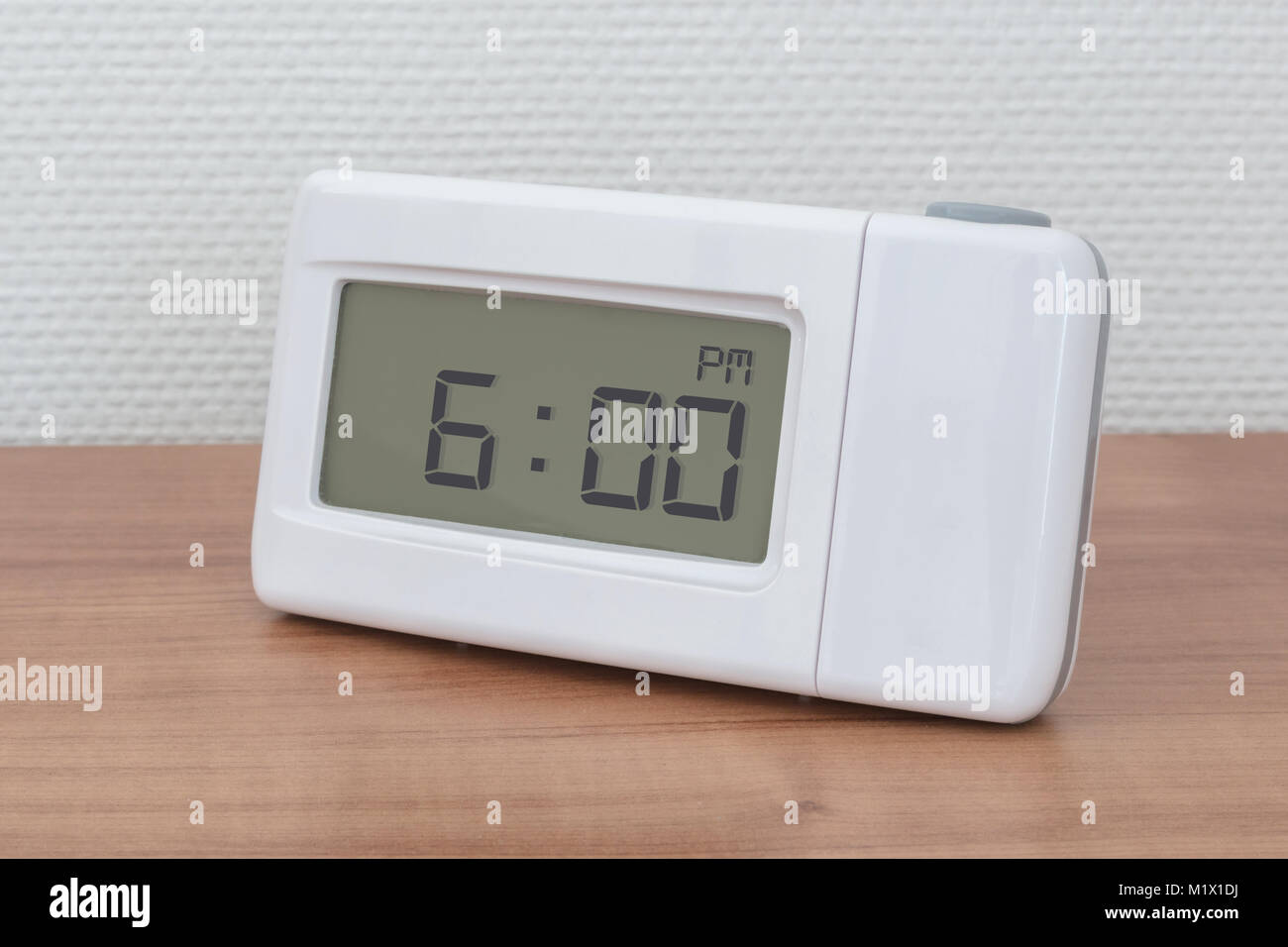 Clock Radio On A Desk Time 06 00 Pm Stock Photo Alamy
