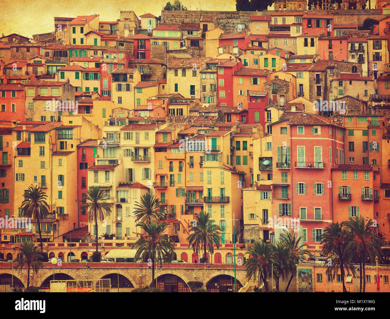 Colorful houses in old part of Menton, France. Added paper texture ...