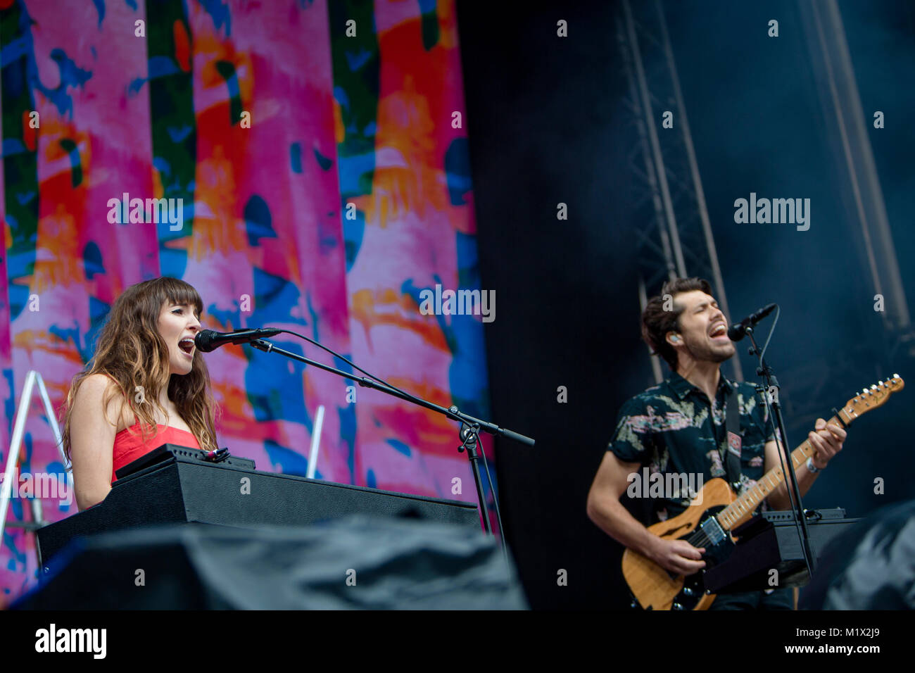 Norway, Bergen – June 17, 2017. The English indie pop duo Oh Wonder performs a live concert during the Norwegian music festival Bergenfest 2017 in Bergen. Here singers and musicians Josephine Vander Gucht (L) and Anthony West (R) are seen live on stage. Stock Photo