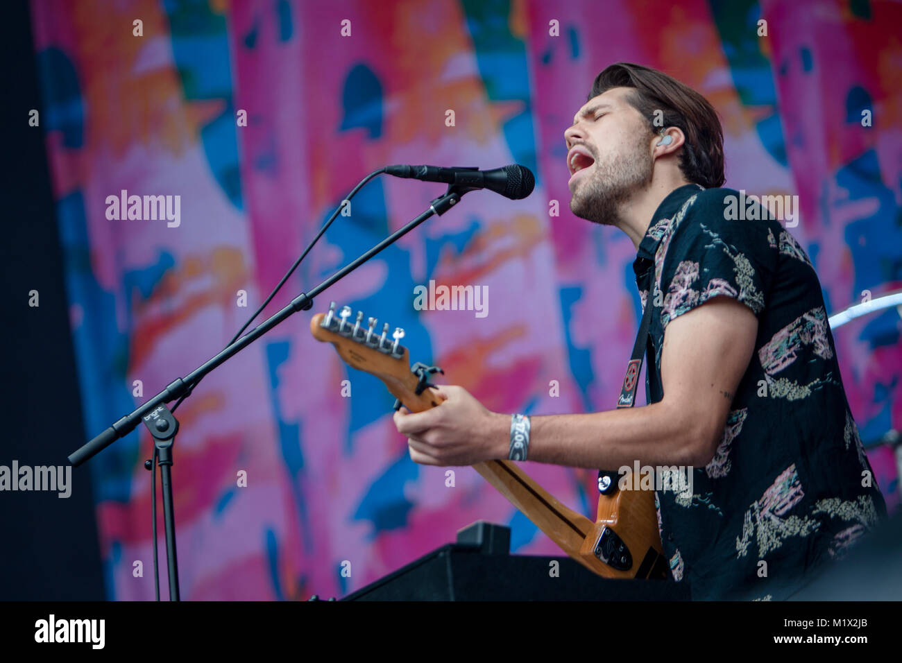 Norway, Bergen – June 17, 2017. The English indie pop duo Oh Wonder performs a live concert during the Norwegian music festival Bergenfest 2017 in Bergen. Here singer and musician Anthony West is seen live on stage. Stock Photo