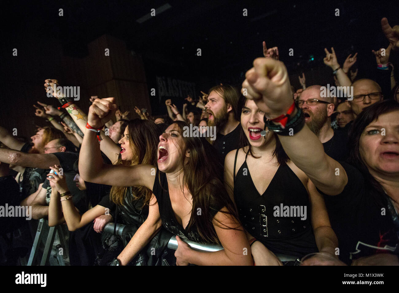 Energetic black metal fans attend a Satyricon concert at the Norwegian