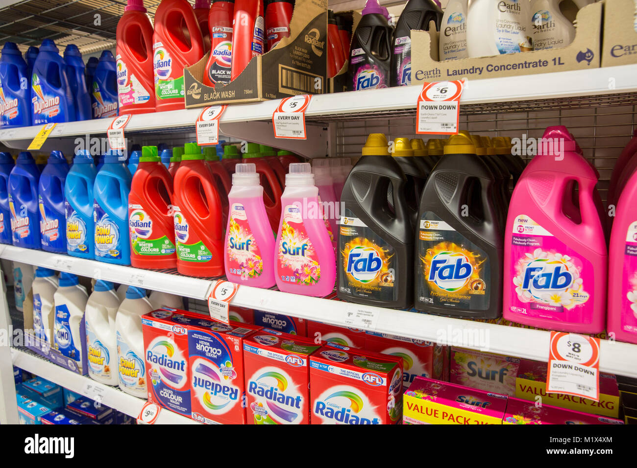 Fab and Surf brands of washing powder liquid on sale in an australian supermarket Stock Photo