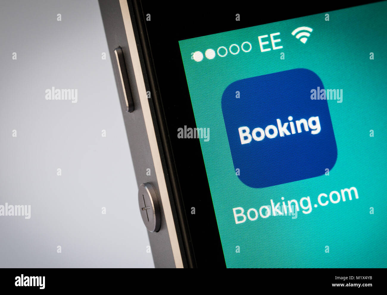 Booking.com app on an iPhone mobile phone Stock Photo