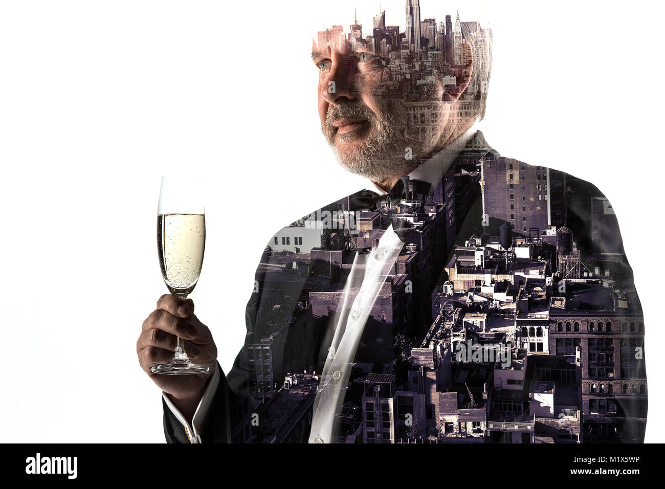 Portrait of bearded businessman. Double exposure city on the background. Stock Photo