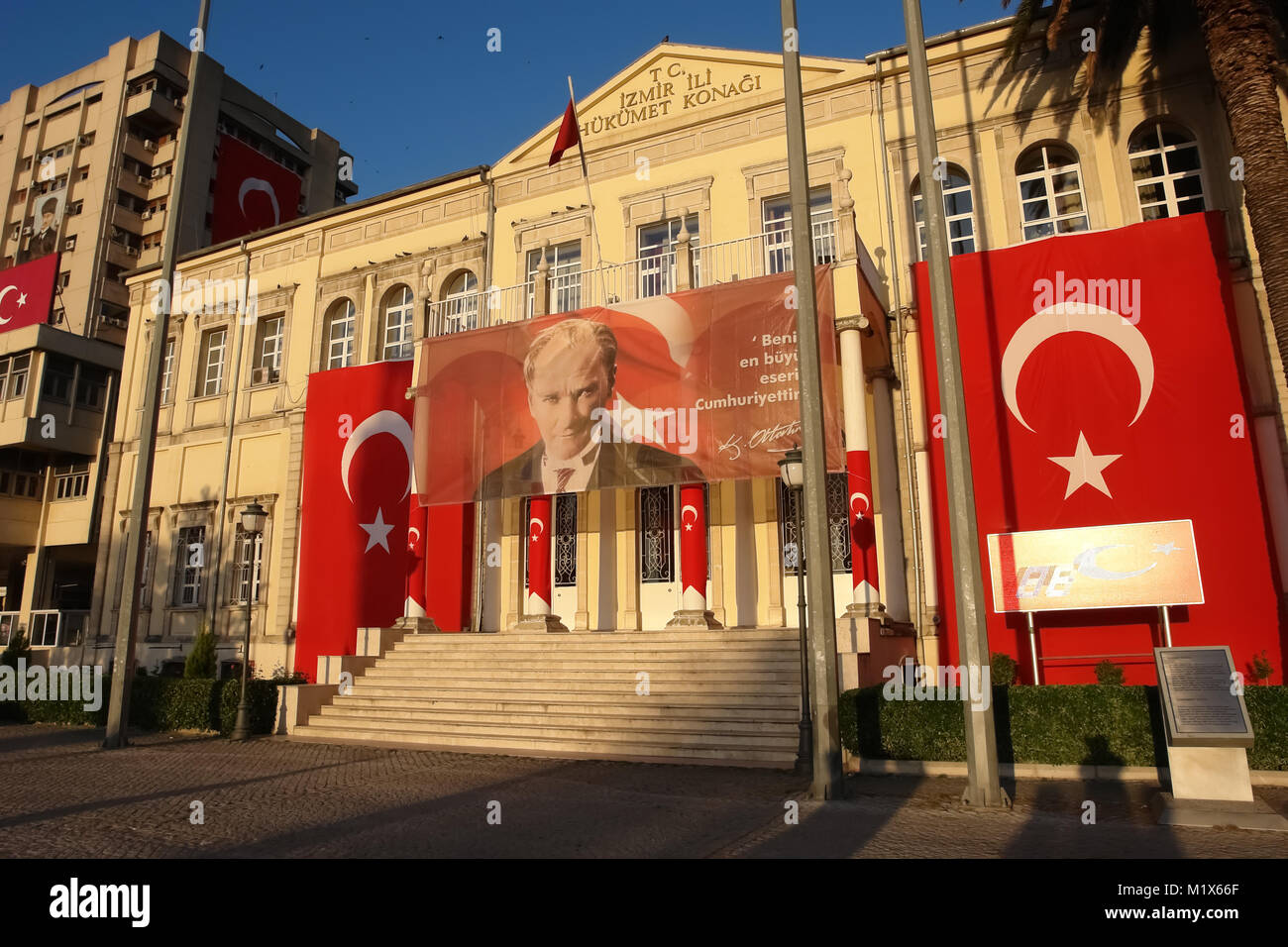 Izmir, Turkey - April 21, 2012: Building of the Government House in evening on sunset in Izmir. The governor's office on Konak Square is one of the ci Stock Photo