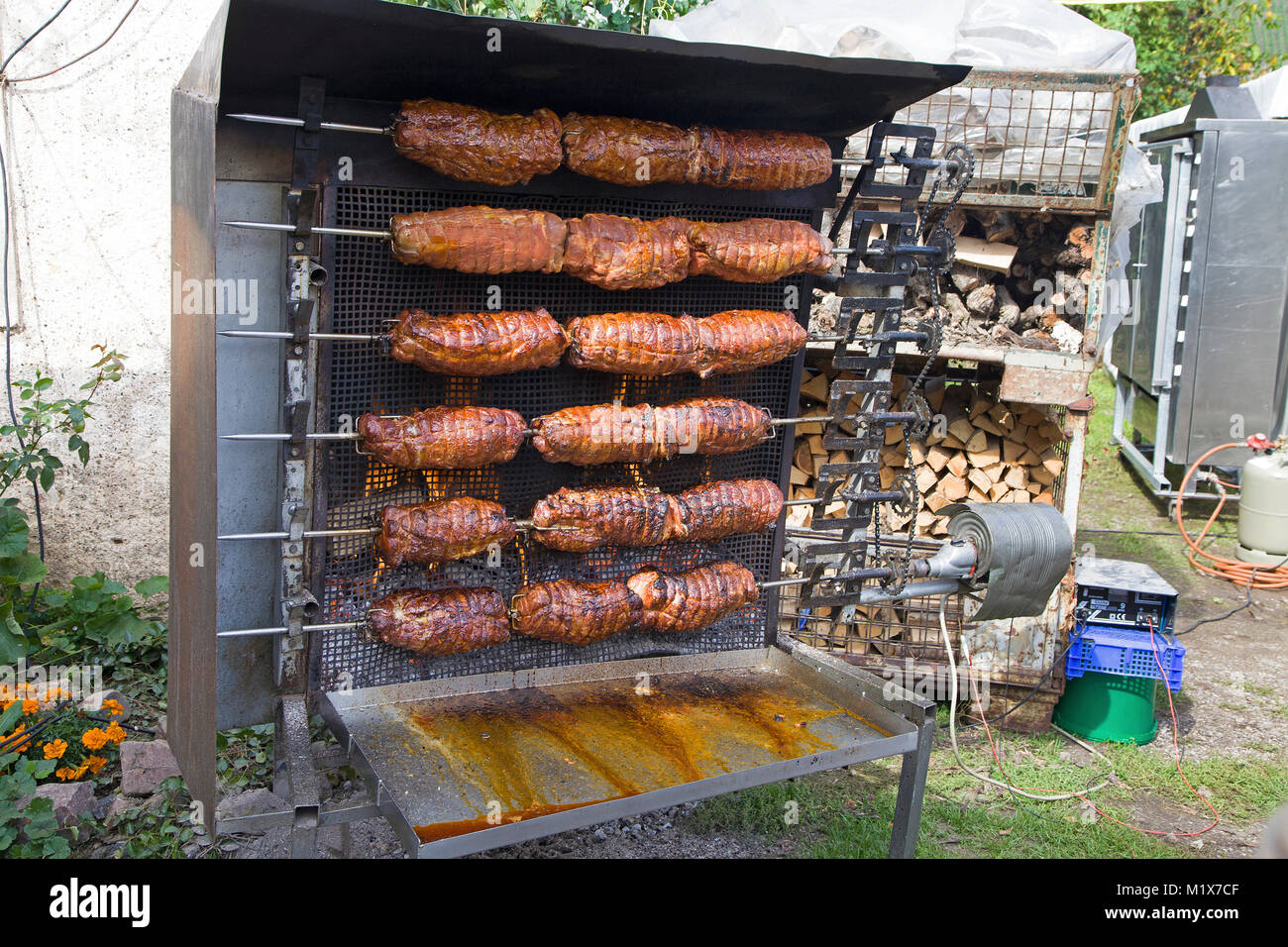 Spit roast on barbecue at wine festival, Brauneberg, Moselle river, Rhineland-Palatinate, Germany, Europe Stock Photo