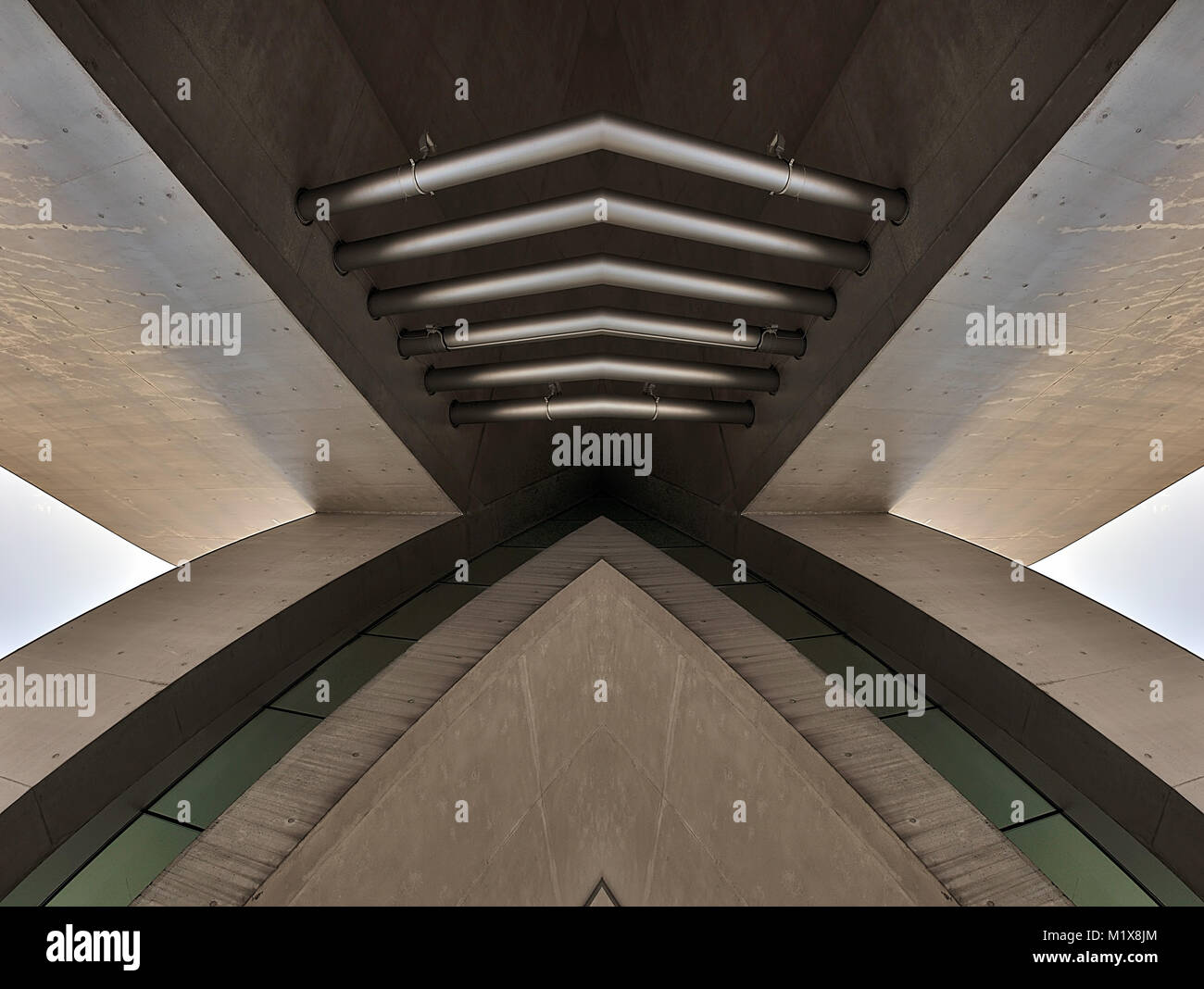 Architectural symmetry obtained with the repeated juxtaposition of the original image Stock Photo