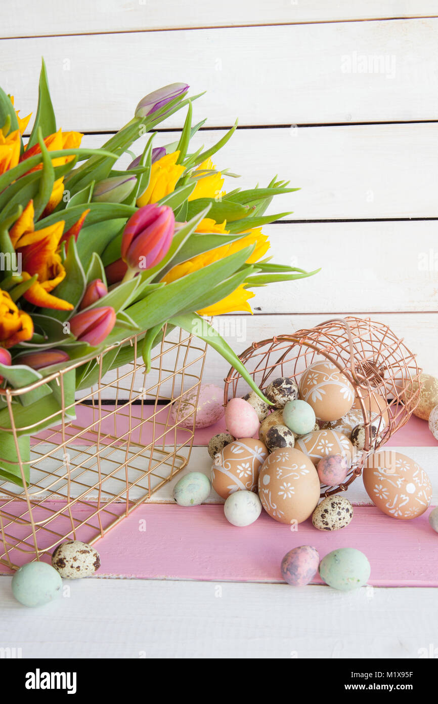 Painted easter eggs and colorful tulips for easter Stock Photo - Alamy