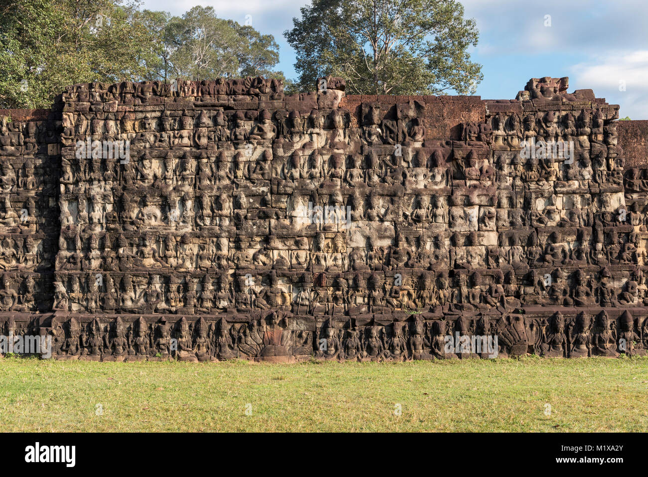 Carvings on the base of Terrace of the Leper King, Angkor Thom, Cambodia Stock Photo