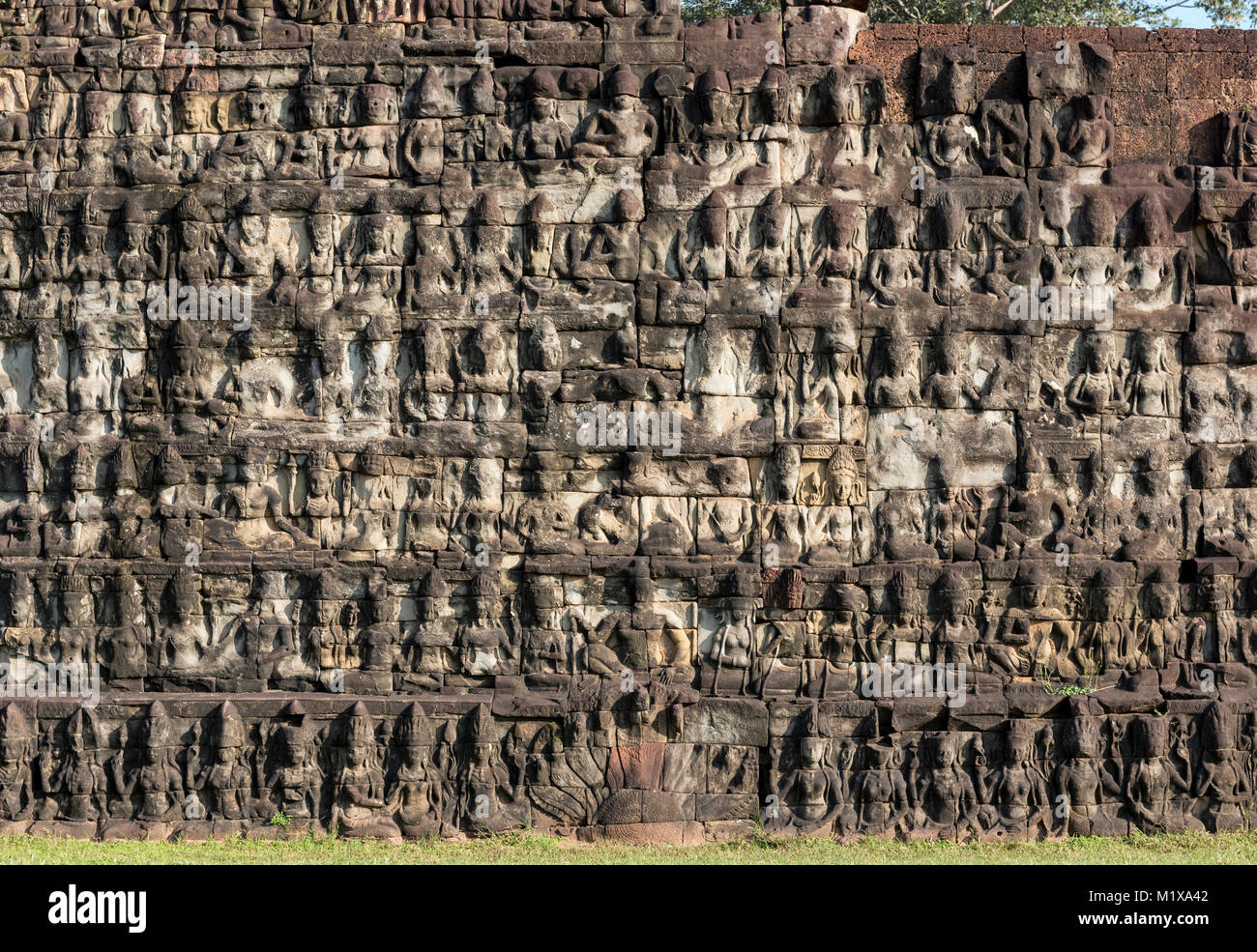 Carvings on the base of Terrace of the Leper King, Angkor Thom, Cambodia Stock Photo