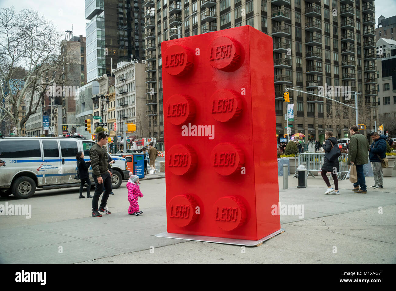 Reminiscent of the monolith in '2001: A Space Odyssey', a ten-foot tall LEGO is placed in Flatiron Plaza in New York, seen on Saturday, January 27, 2018. The huge brick celebrates the 60th anniversary of Lego, conveniently right opposite the LEGO store, and consists of over 133,000 LEGO bricks, weighing in at over 1200 pounds and taking 350 hours to construct. The 60th anniversary LEGO sets are on sale now. (© Richard B. Levine) Stock Photo