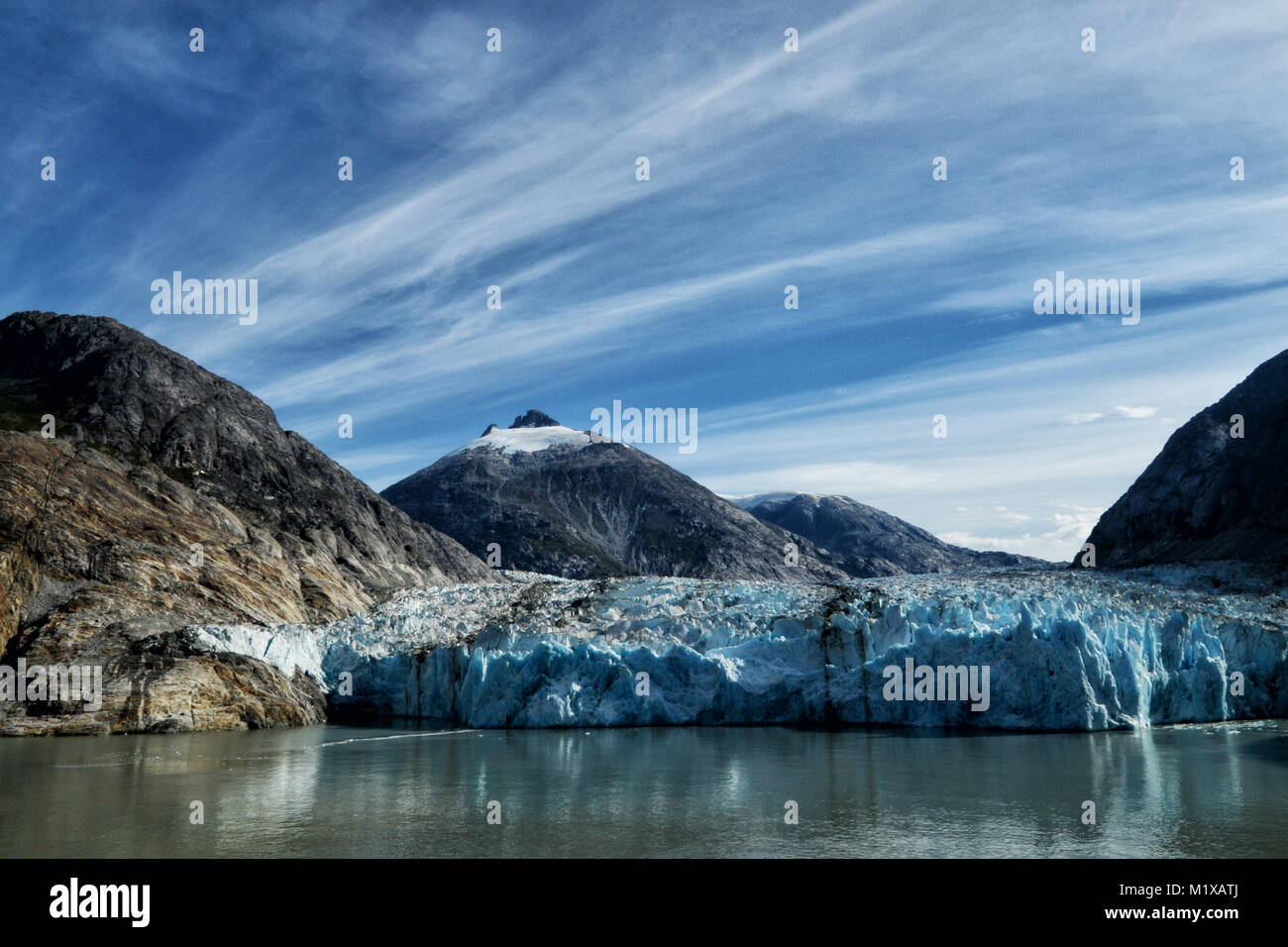 Endicott arm glacier surrounded by mountains. Stock Photo