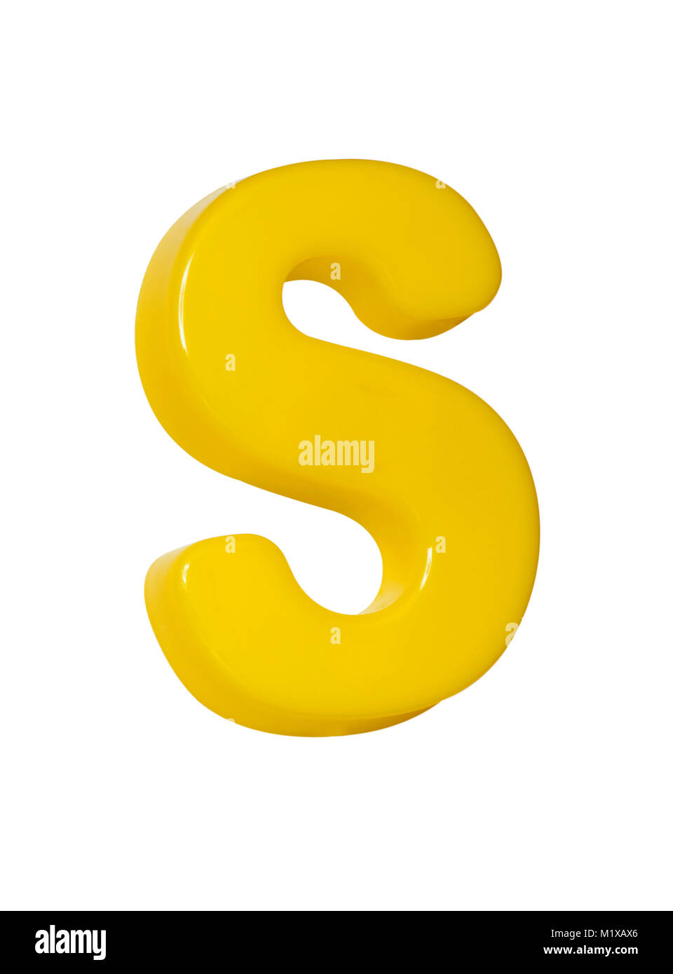 A cut out shot of a yellow plastic letter 'S' Stock Photo