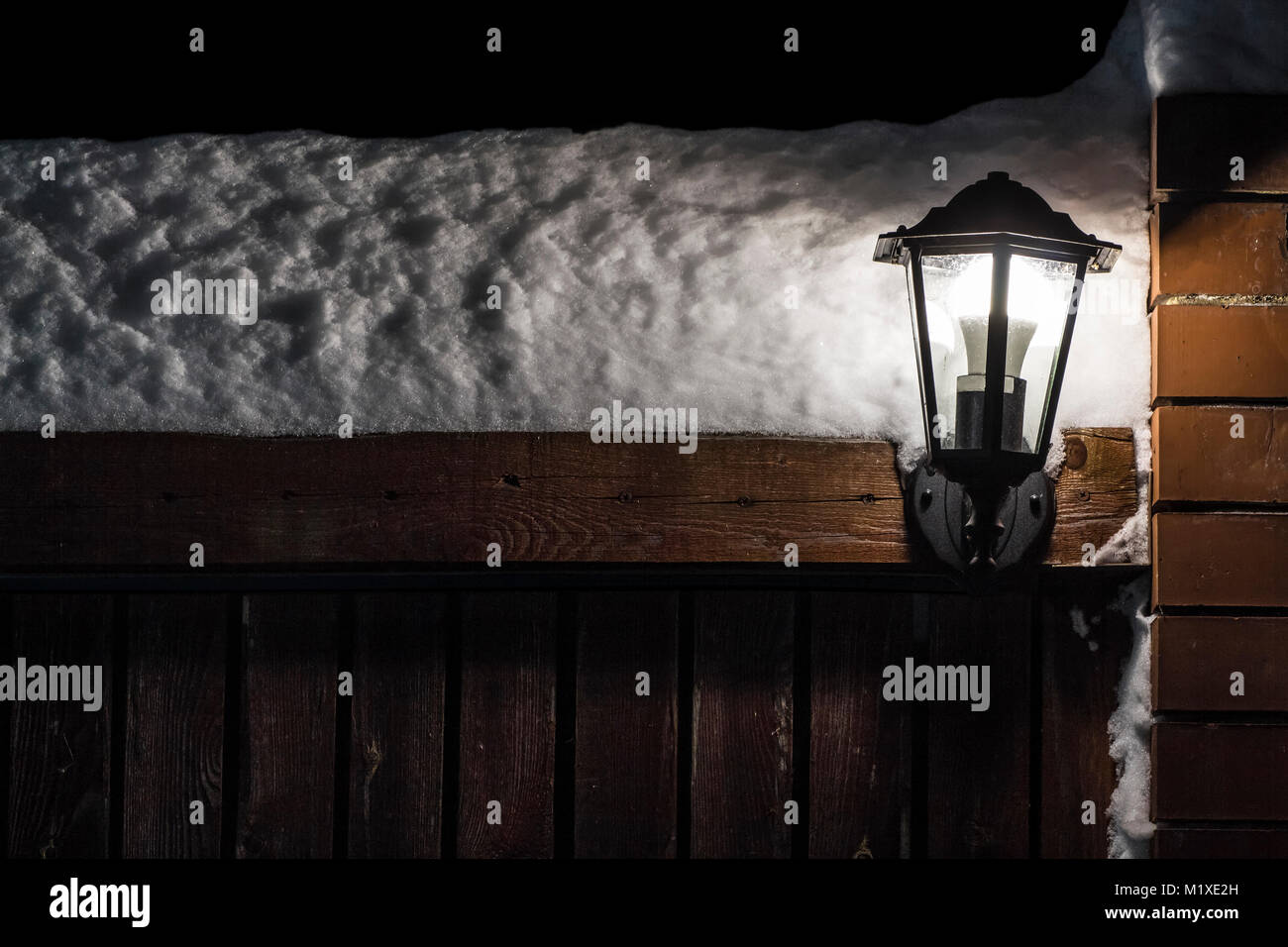 Vintage lantern wooden fence hi-res stock photography and images - Alamy