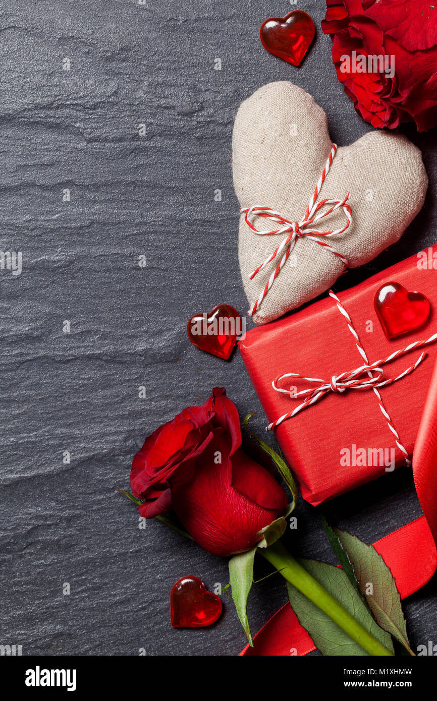 Valentine's day background with red rose, gift box and heart Stock ...