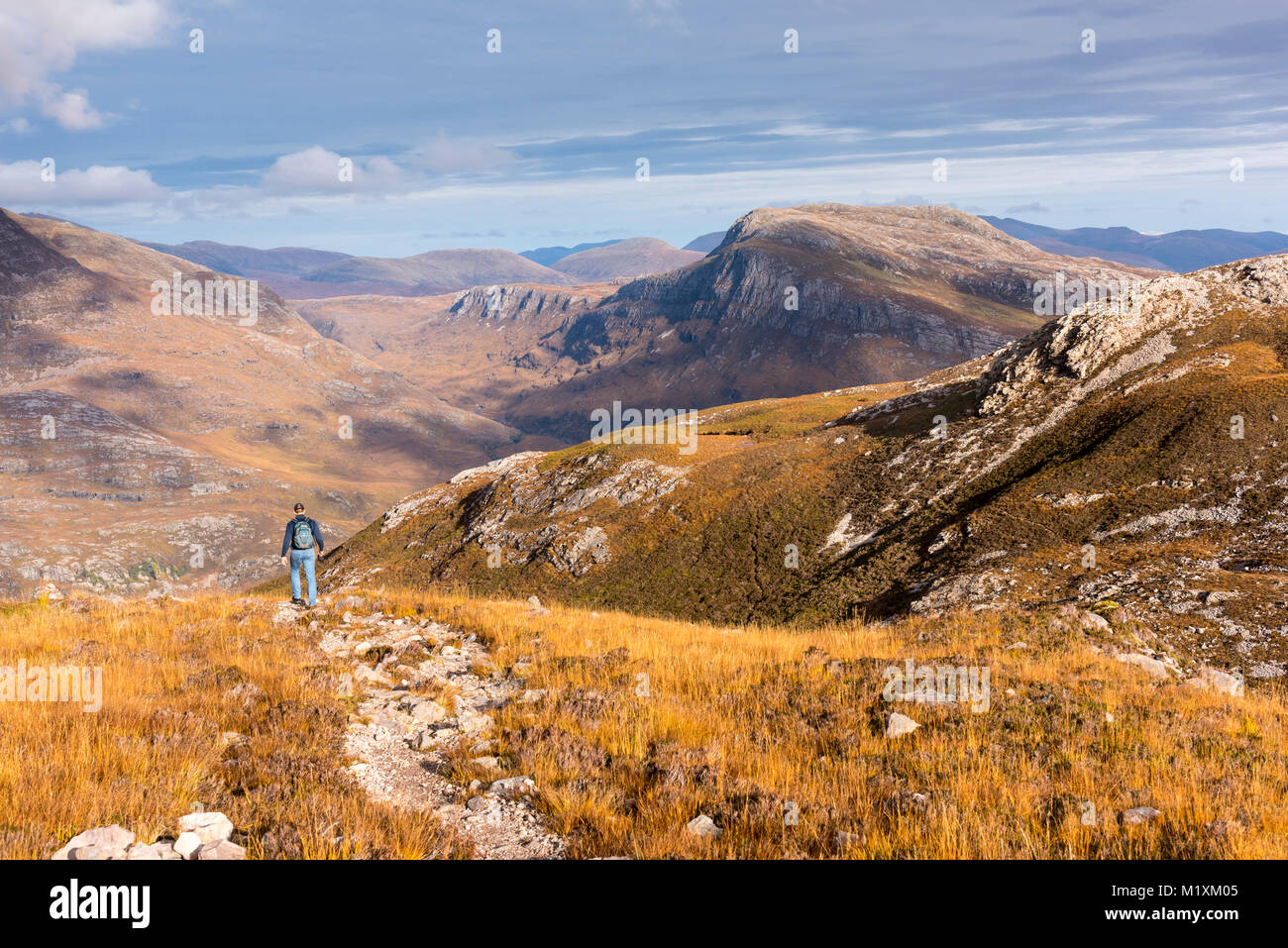 Walking in the mountain region of Beinn Eighe Natural Nature reserve overlooking Loch Maree Scottish Highlands Scotland UK Stock Photo