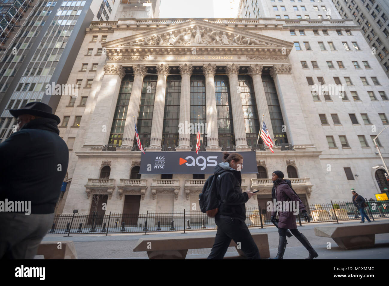 The New York Stock Exchange is decorated for the first day of trading of the Initial Public Offering for PlayAGS on Friday, January 26, 2018. PlayAGS designs and supplies electronic slot machines and other gaming services and supplies to the gambling industry. (© Richard B. Levine) Stock Photo