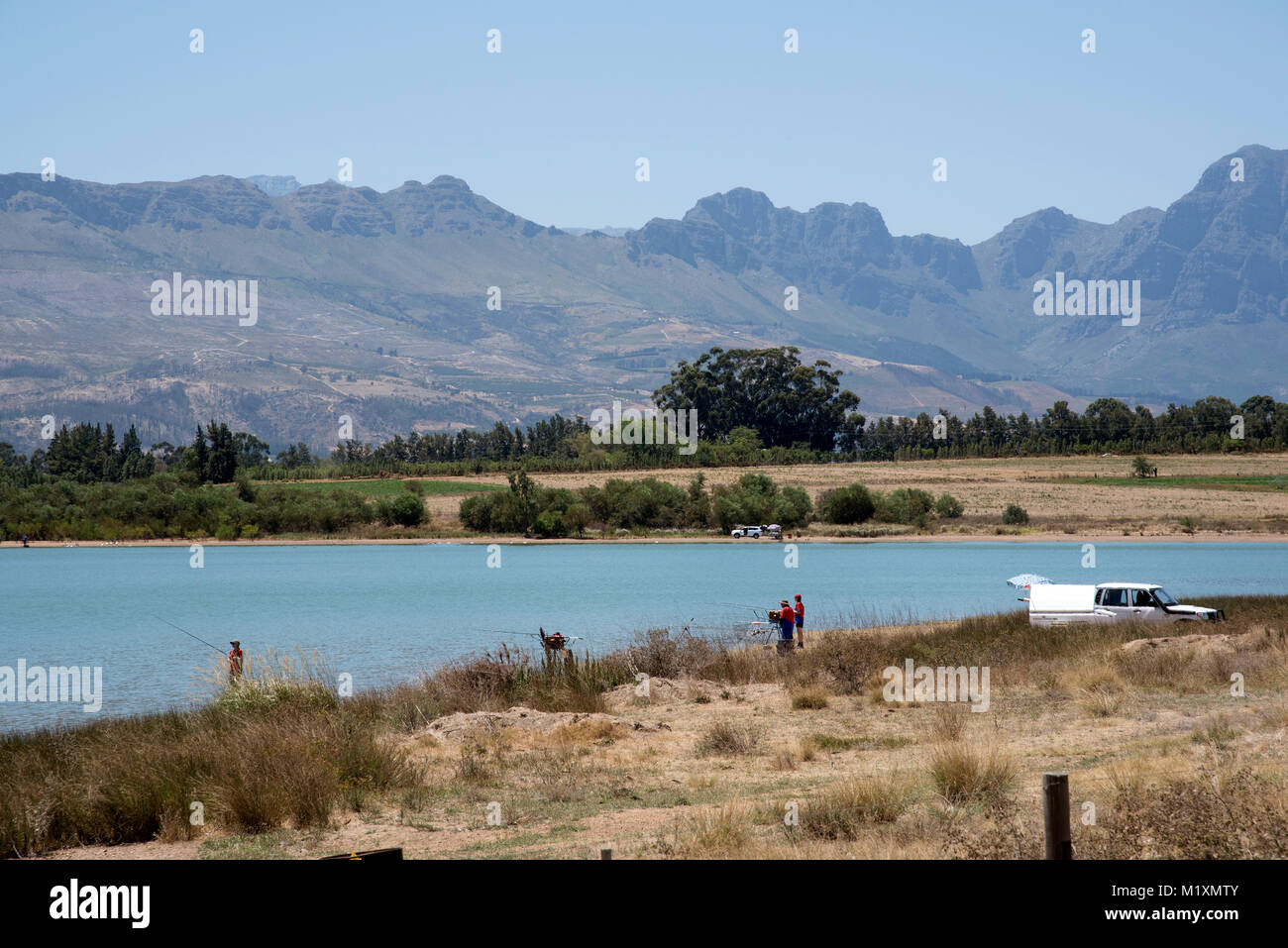 People fishing on a Paarl reservoir in the Western cape South Africa Stock Photo